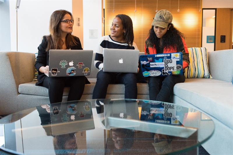 Two colleagues working together at a desk